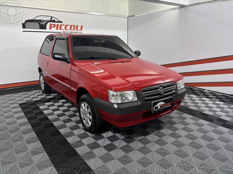 FIAT - UNO 1.0 MPI LE WAY ECONOMY 8V FLEX 2P MANUAL - 2012/2013 - VERMELHA - R$ 27.900,00